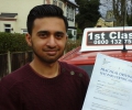 Sadik with Driving test pass certificate